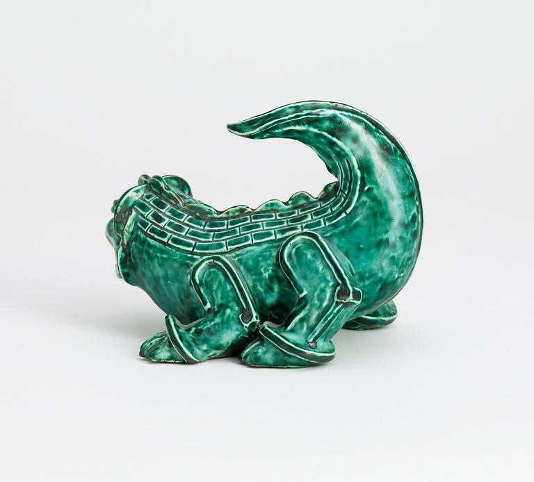 A Wilhelm Kåge stoneware figure of a dragon puppy, Gustavsberg circa 1940.