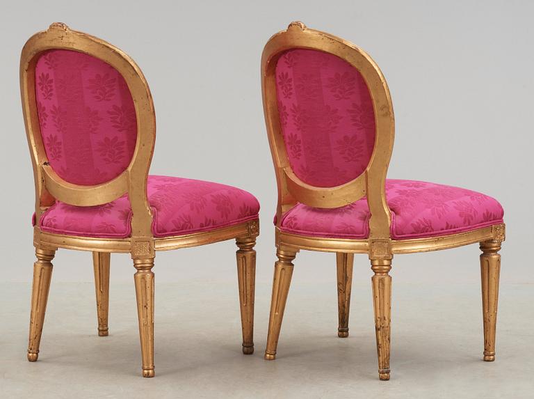 A pair of Gustavian late 18th century chairs.