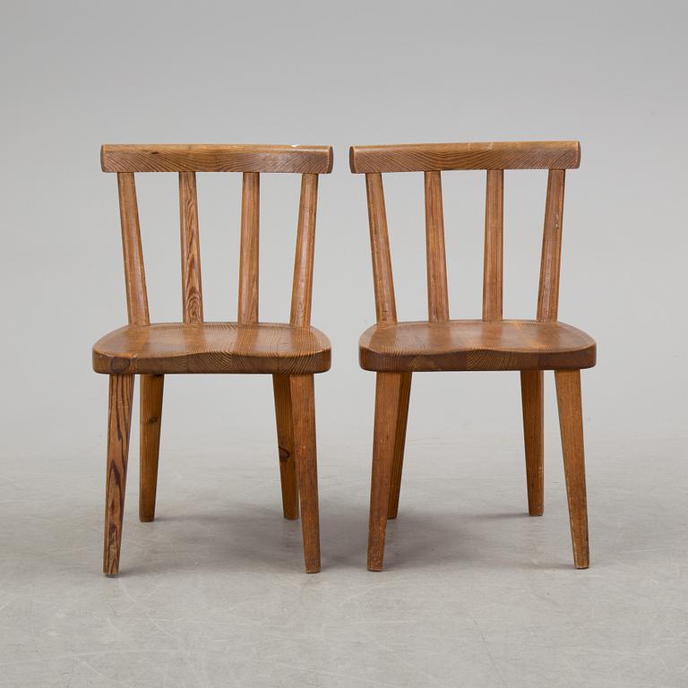 A pair of "Utö" pinewood chairs by Axel Einar Hjorth in the 1930's.