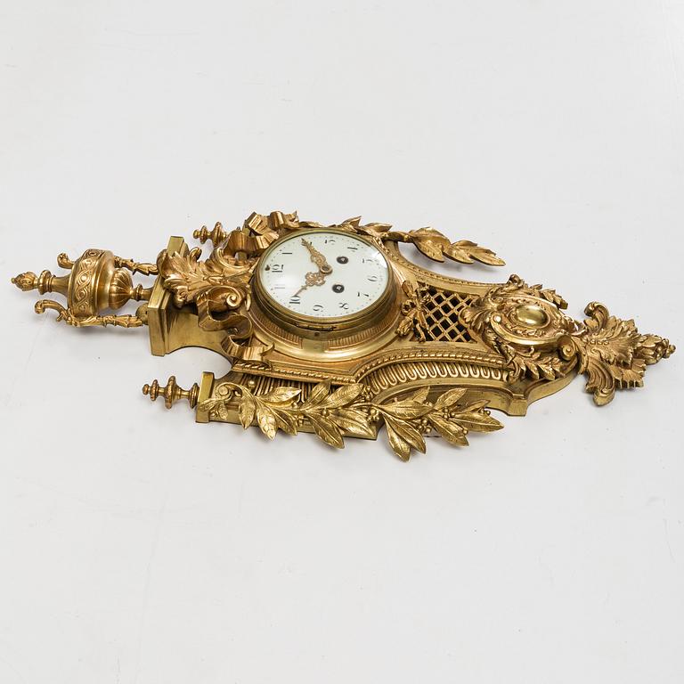 A first half of the 20th century brass wall clock.