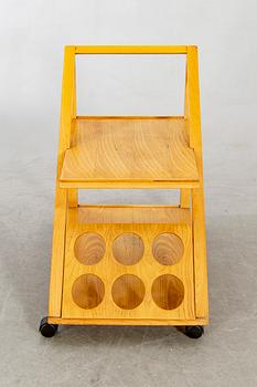 An Italian oak trolley later part of the 20th century.