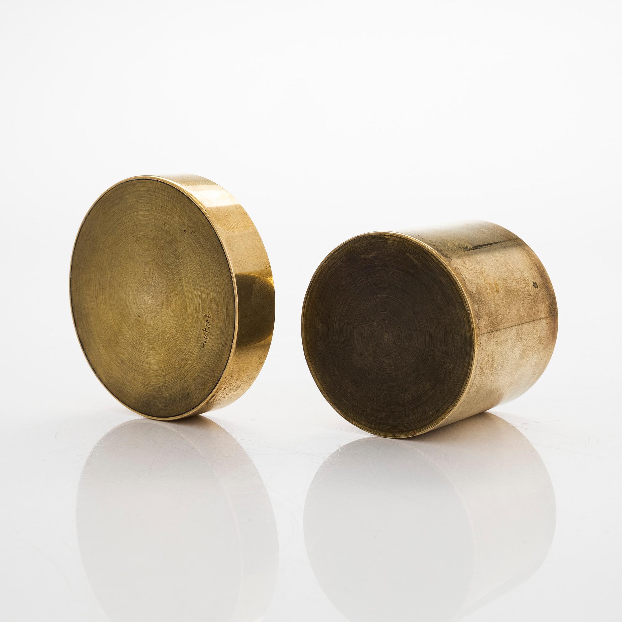 Maija Heikinheimo, a set of two mid-20th century brass jars, manufacturer Valaistustyö for Artek.