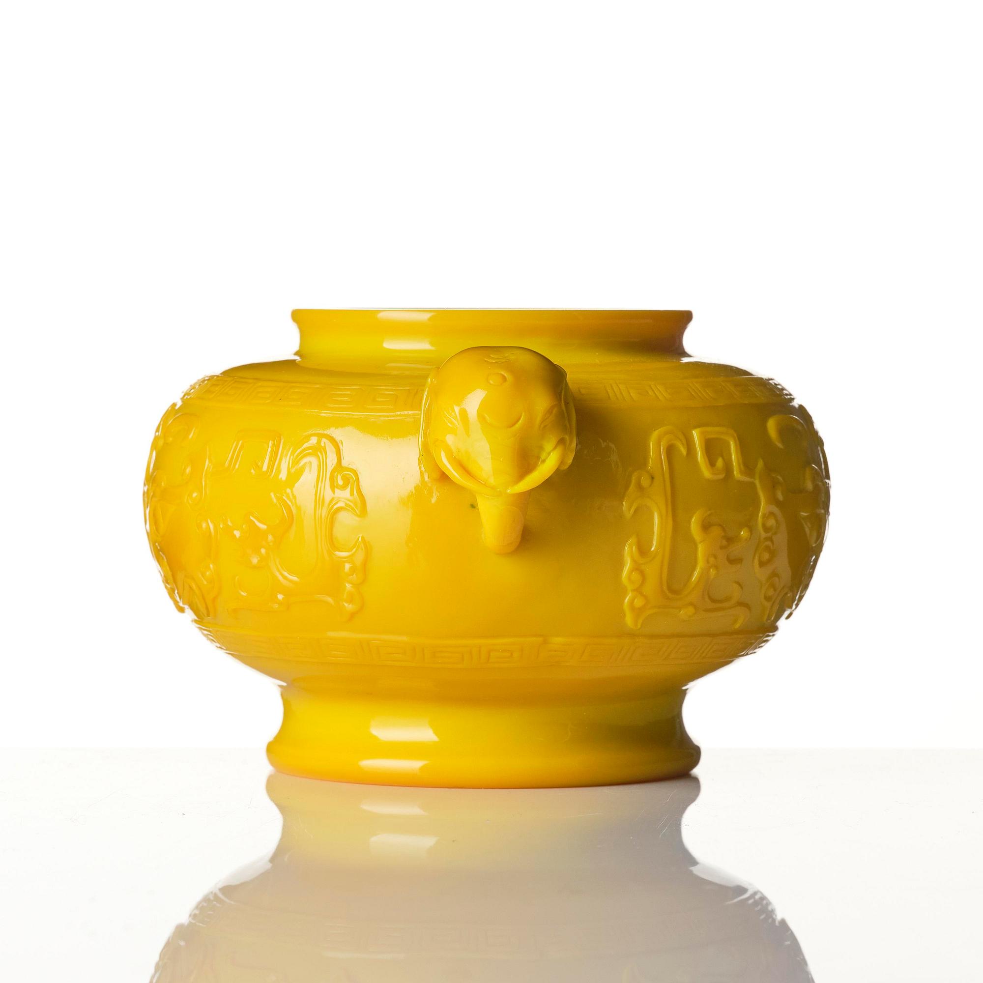 An elegant moulded yellow glass censer, late Qing or early 20th century.