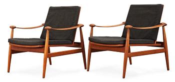 A pair of Finn Juhl teak easy chairs, France & Daverkosen, Denmark.
