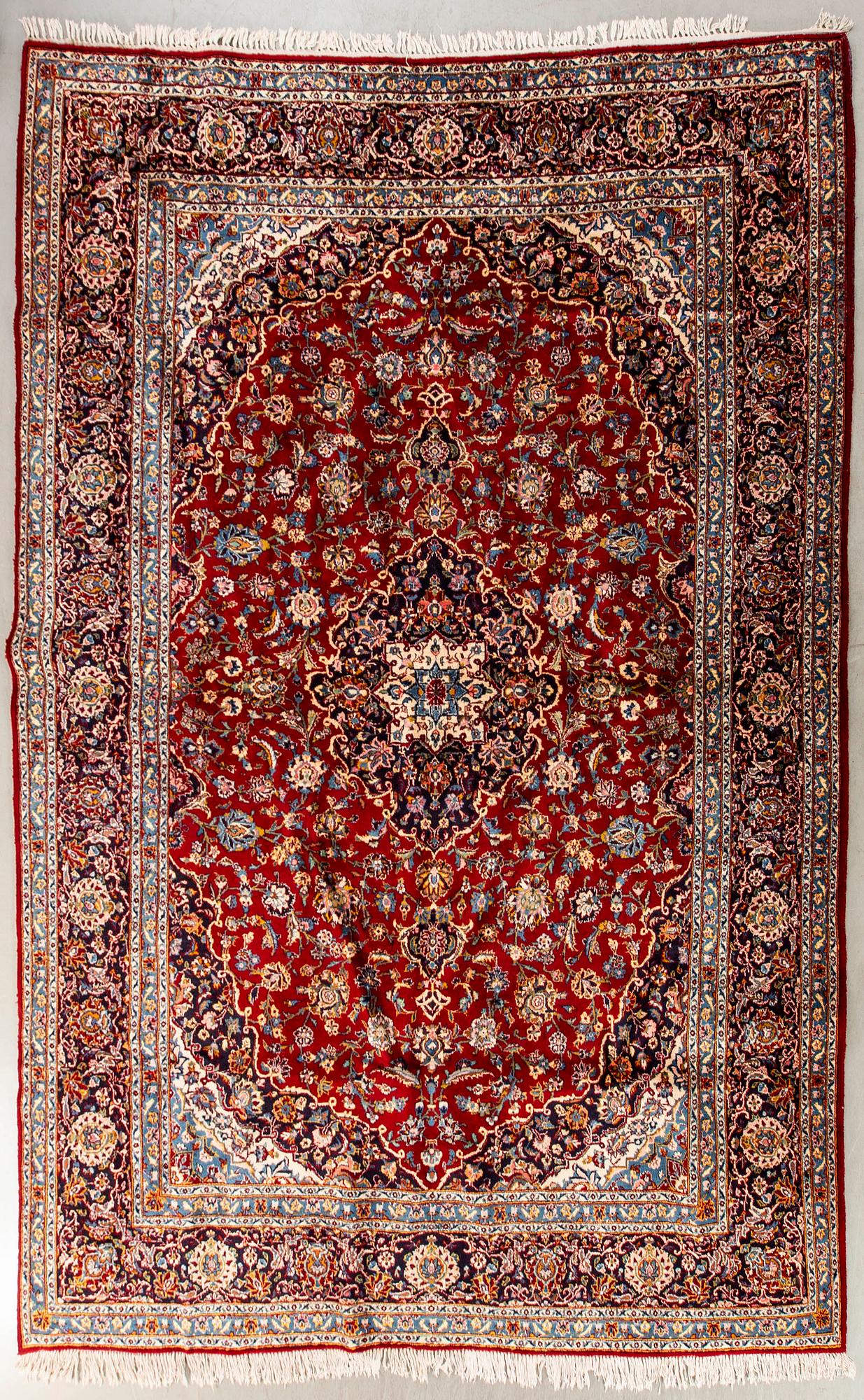 An old Kirman carpet ca 369 x 273 cm.