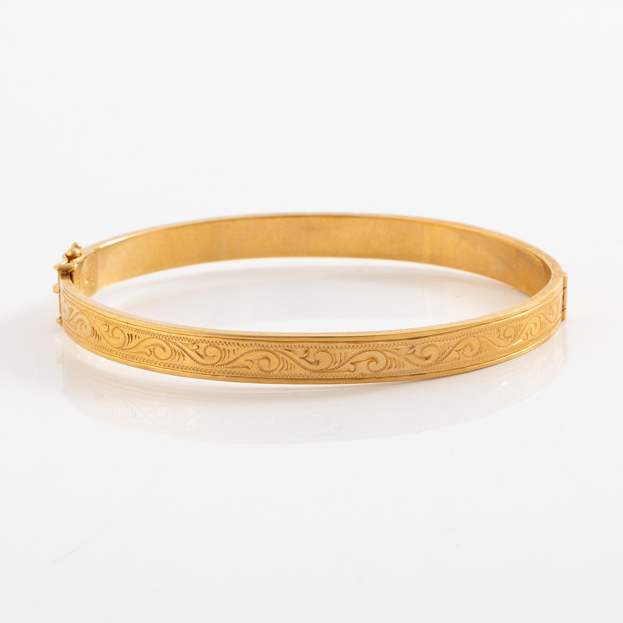 Arm ring, 18K gold.