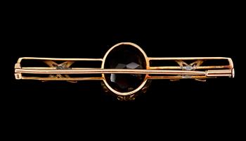 BROSCH, guld och silver, med små rosenstenar, omkring år 1900.