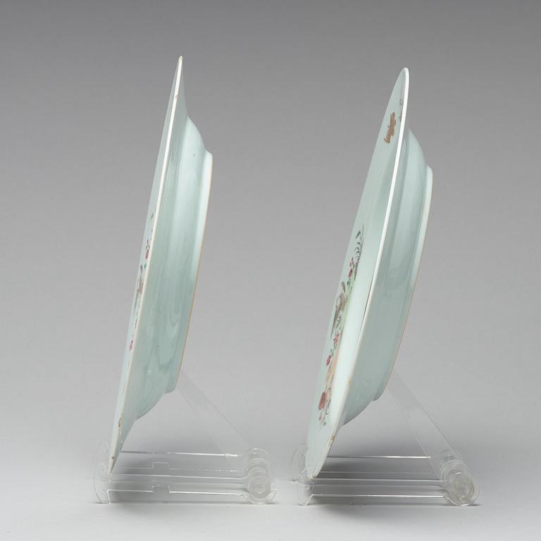 A pair of famille rose 'double peacock' dishes, Qing dynasty, Qianlong (1736-95).