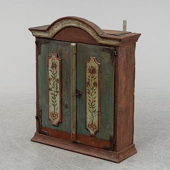 A 19th century painted cabinet.