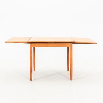 A teak table from the middle of the 20th century.