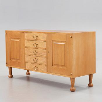 Josef Frank, an elm and mahogany sideboard, Svenskt Tenn, model 727, probably 1960's.