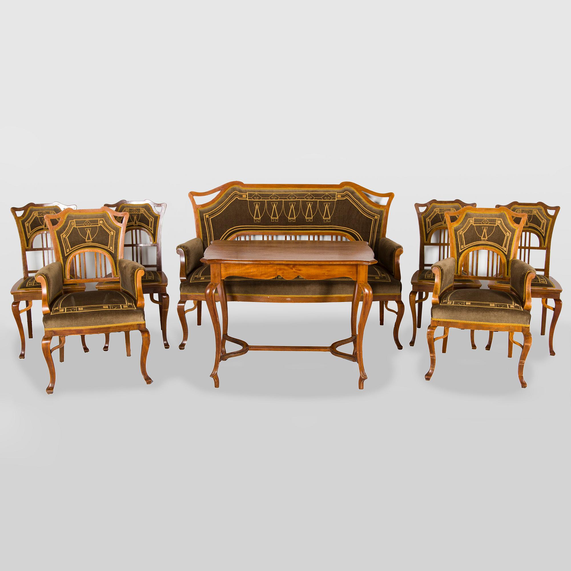 An eight piece Art Nouveau lounge suite in mahogany, Belgium/Netherlands, early 20th century.