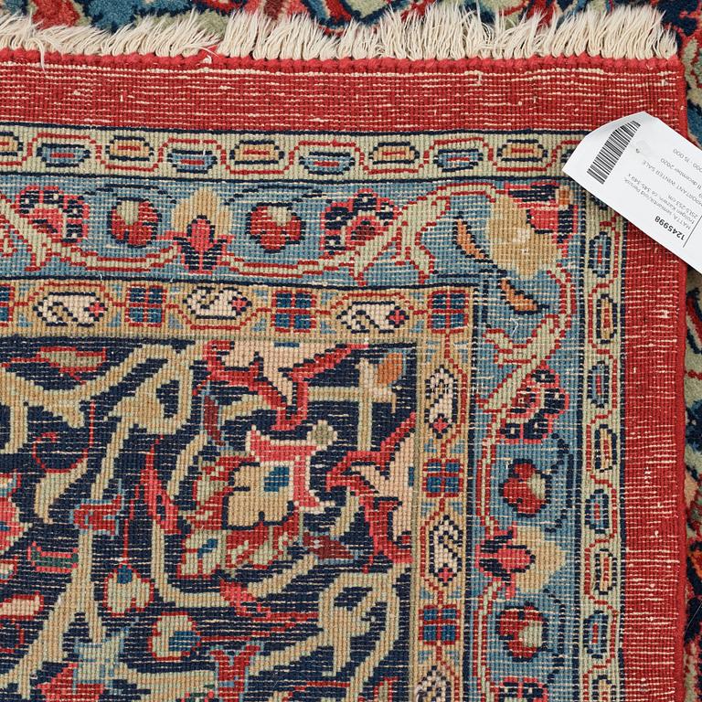 A carpet, a semi-antique/an old Persian, probably a Qazvin, ca 345-349 x 251,5-253 cm.