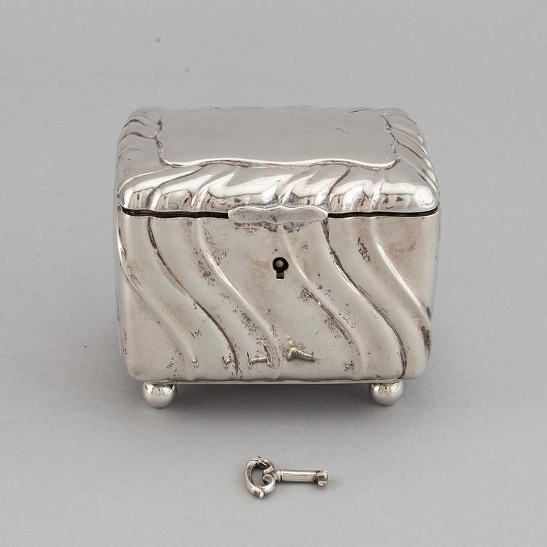 A 20th century parcel-gilt silver sugar-box, Swedish import marks from 1919.