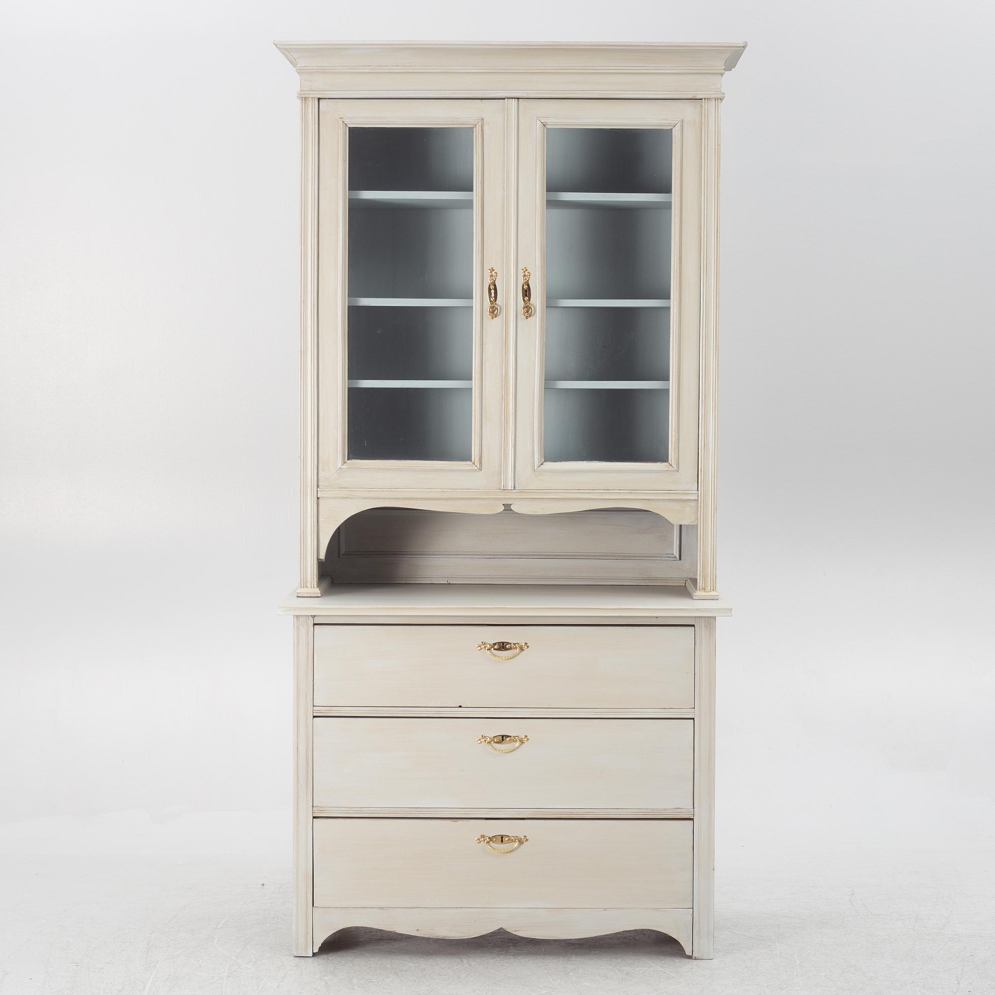 Display cabinet, early 20th century.