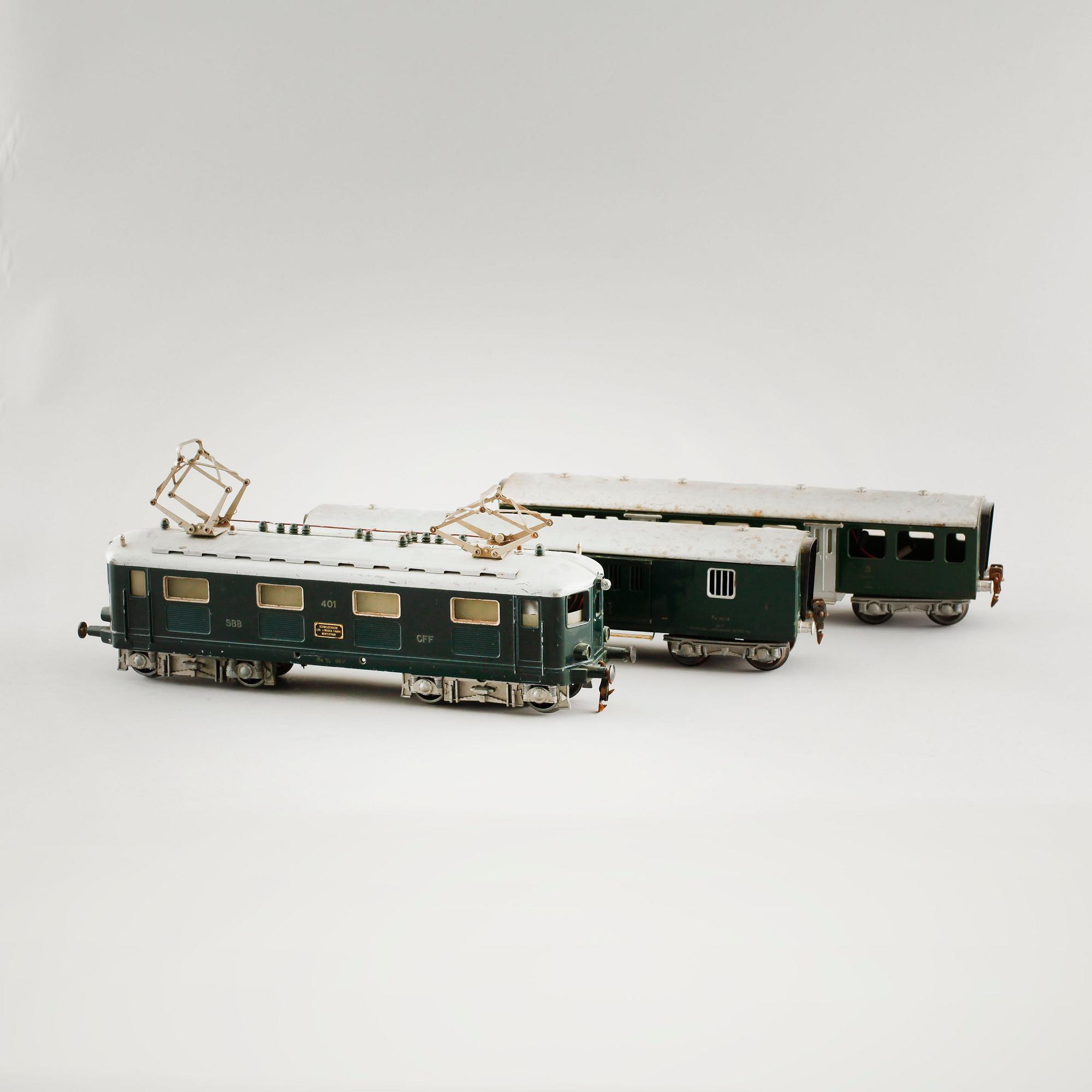 A 1940/50s model train set of 31 pcs in O-scale made by HAG, Switzerland.