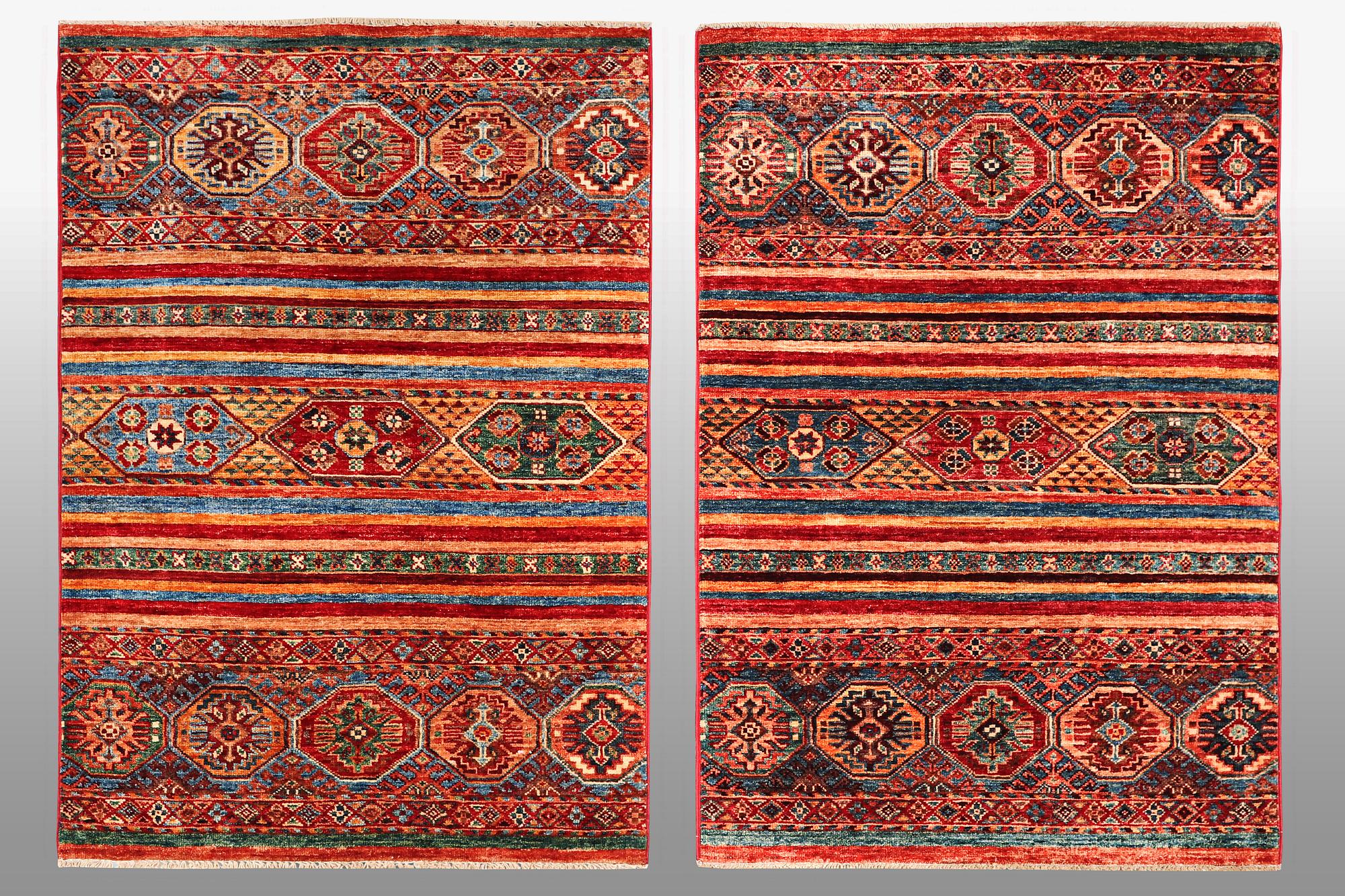 A pair of rugs, Khorjin, ca 128 x 82 cm & ca 123 x 84 cm.