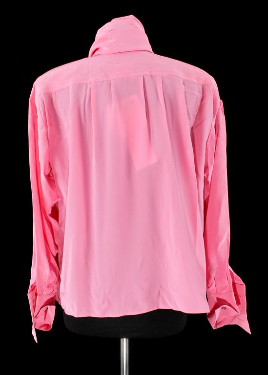 A set of two silk blouses by Yves Saint Laurent.