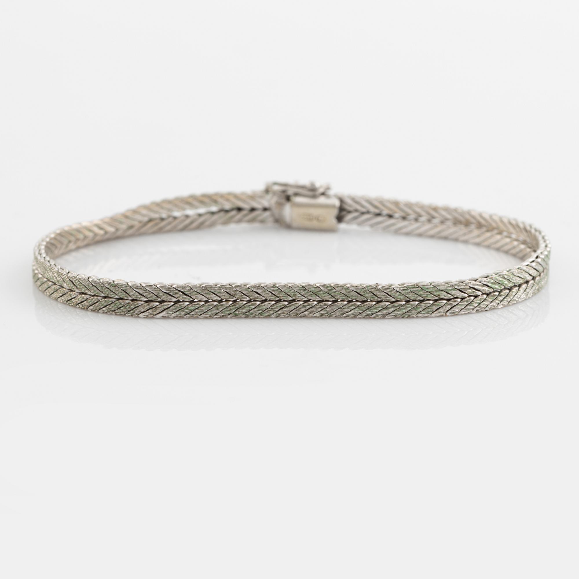 18K white gold bracelet.