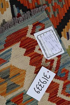 A carpet, kilim 343 x 250 cm.