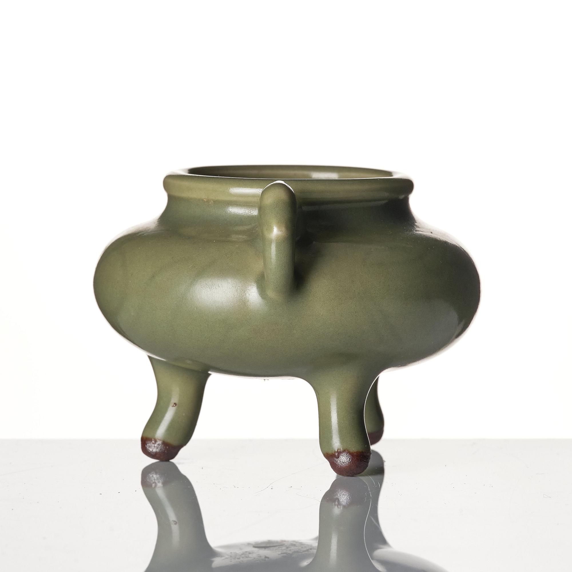 A celadon tripod brush-washer/censer, late Ming dynasty.