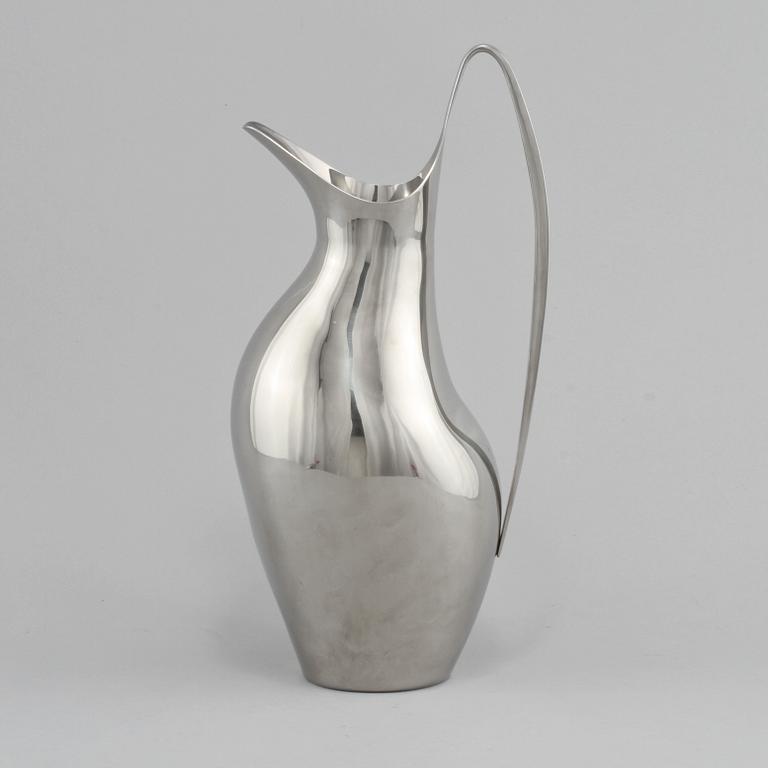 KANNA, stål, "Fluid", Henning Koppel, Georg Jensen, formgiven 1952.