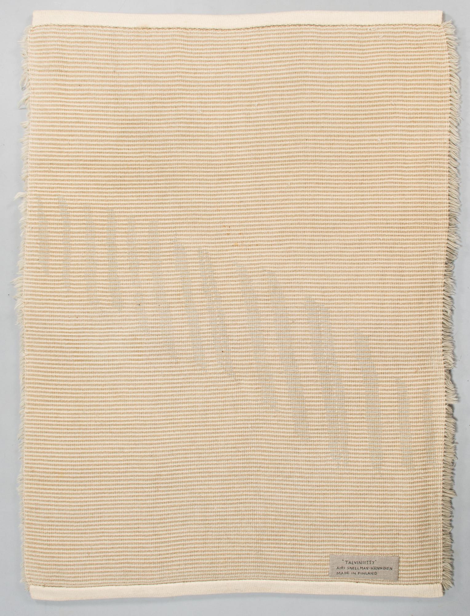Airi Snellman-Hänninen, a rug signed Airi Snellman-Hänninen.