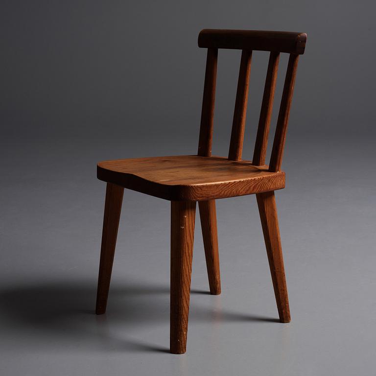 Axel Einar Hjorth, a set of four stained pine "Utö" chairs, Nordiska Kompaniet, Sweden 1930s.