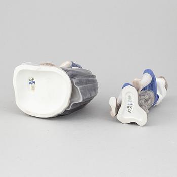 A set of four porcelain figurines, Bing & Grøndahl and Royal Copenhagen, Denmark.