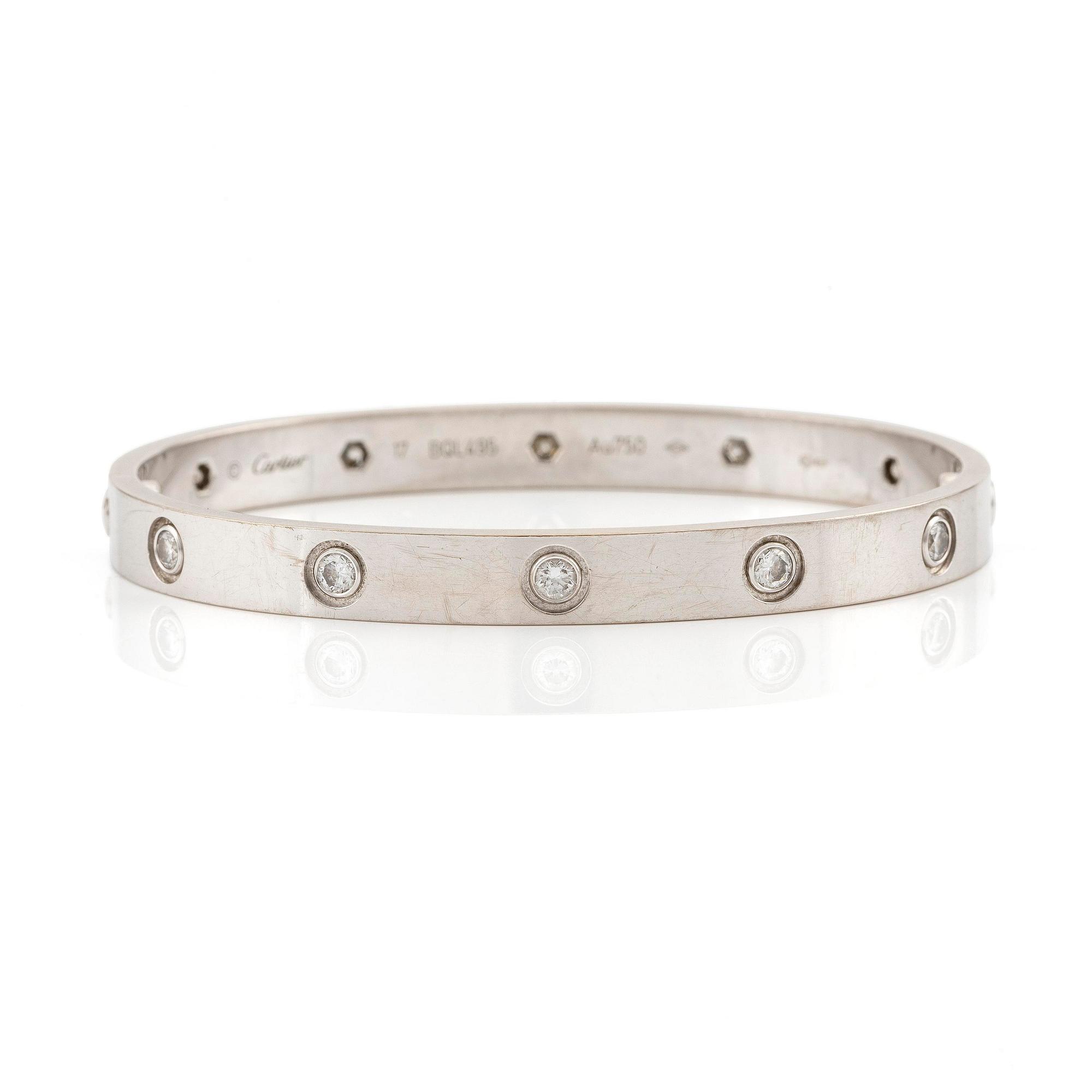 Cartier armband " Love" 18K vitguld med tio runda briljantslipade diamanter.