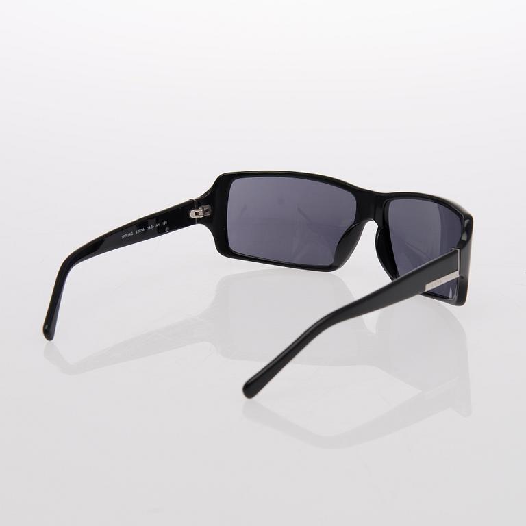 Two Pairs of Sunglasses, Prada and Chanel.