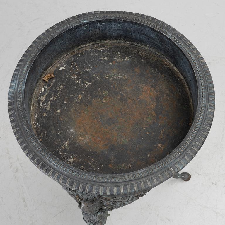 A plant stand, late 20th century.