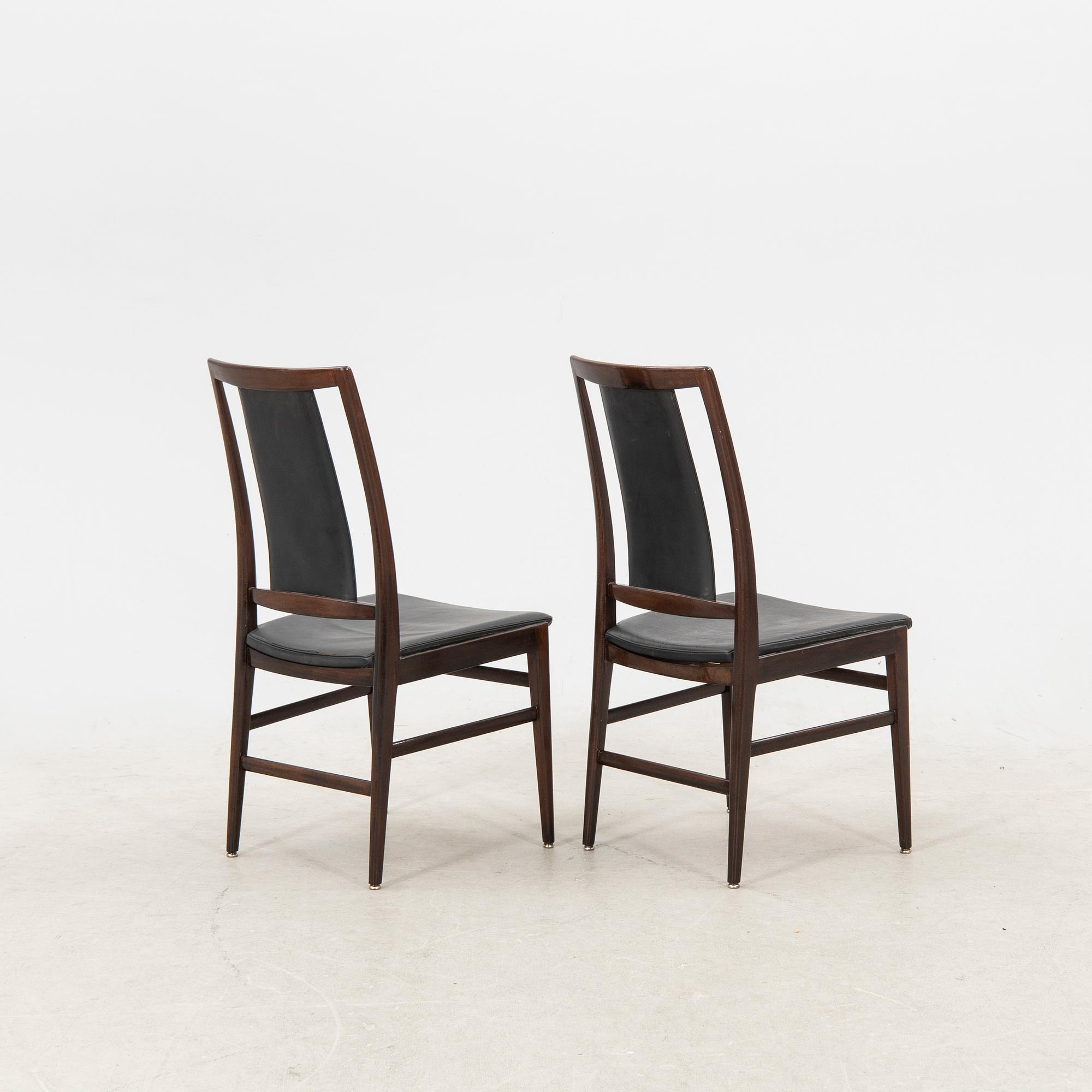 A table and four chairs in lacquered mahogany by David Rosén, "Triva-diné", middle of the 20th century.