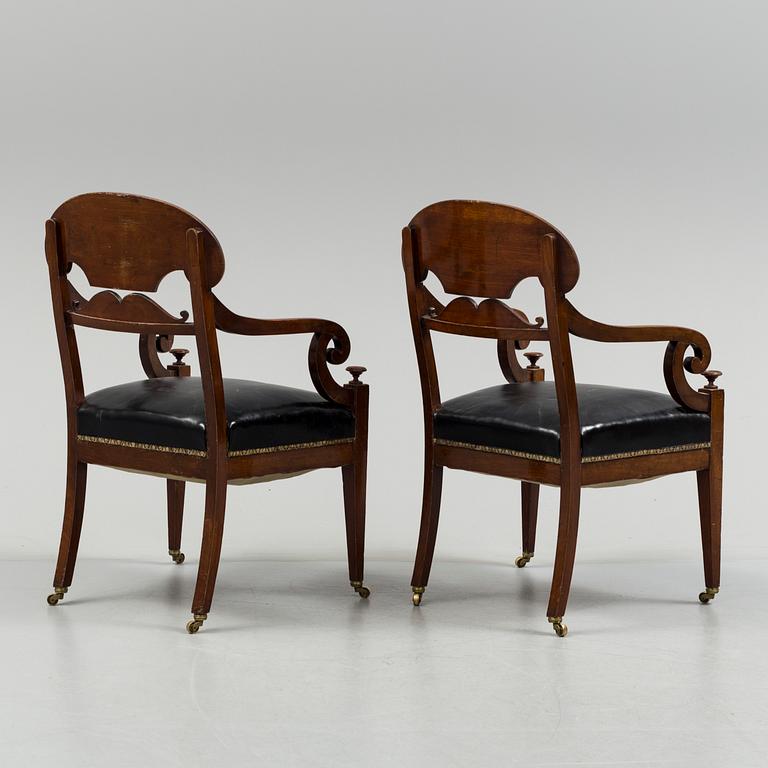 A pair of early 19th century mahogany  Empire armchairs, presumably from the Baltic countries.