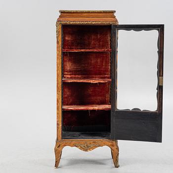 A 19th century, Rococo style display cabinet.