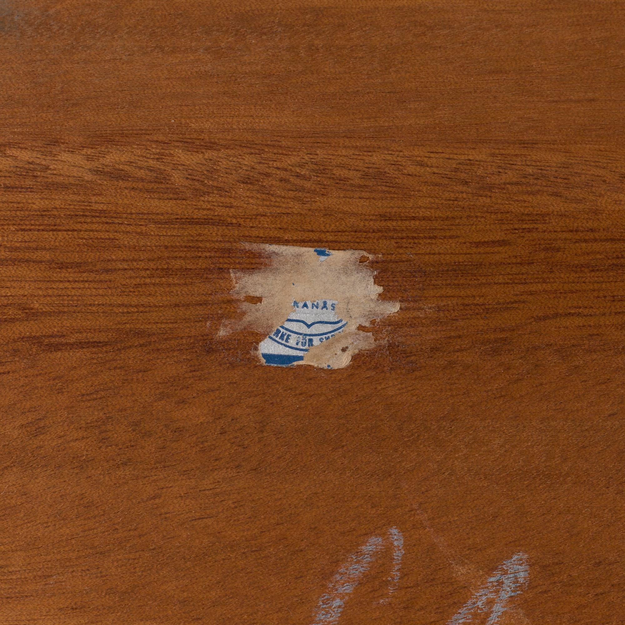 1960s Yngve Ekström coffee table veneered with teak and oak.
