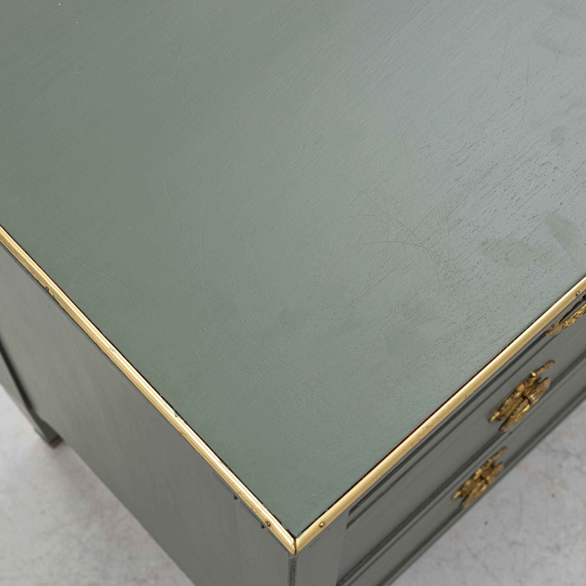 A Gustavian style chest of drawers, circa 1900.