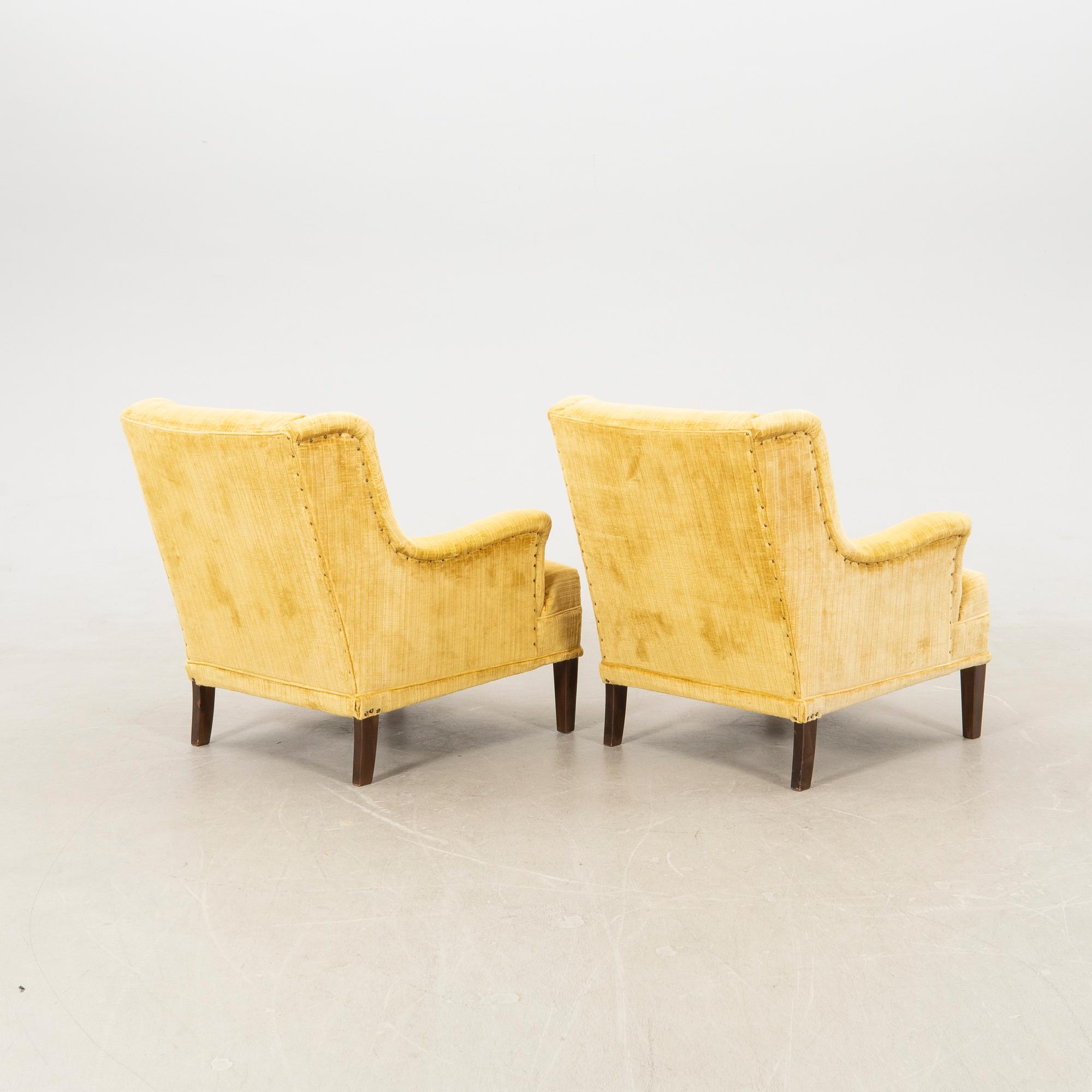 Armchairs a pair of "Cosy" Nordiska Kompaniet (NK) later part of the 20th century.