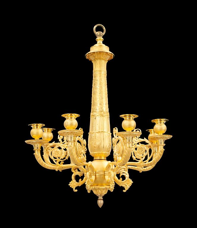 A French Empire early 19th century gilt bronze eight-light hanging lamp.