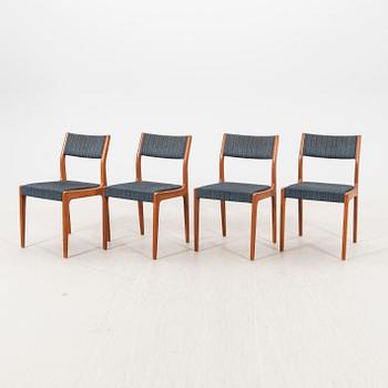 A set of four 1960s teak chairs.