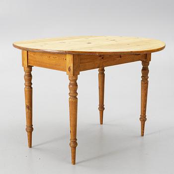 A folding table, early 20th Century.