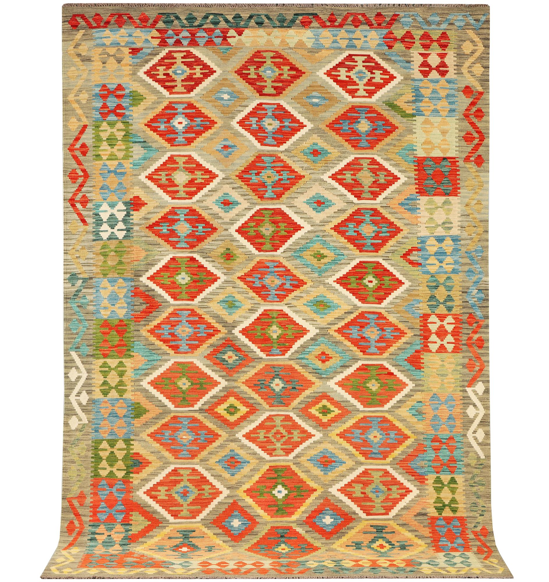 An Afghan Kilim carpet, c. 305 x 200 cm.