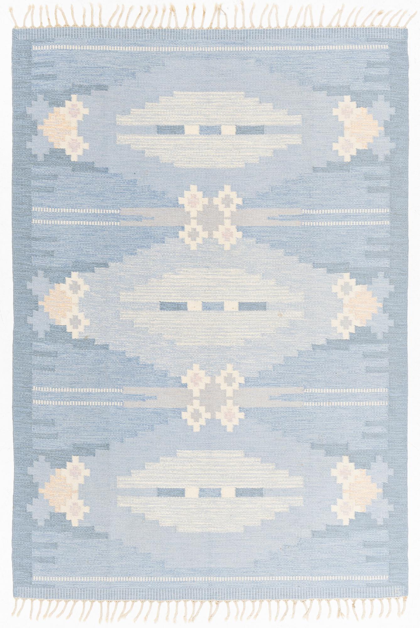 Ingegerd Silow, a carpet, c 235 x 166 cm, signed IS.