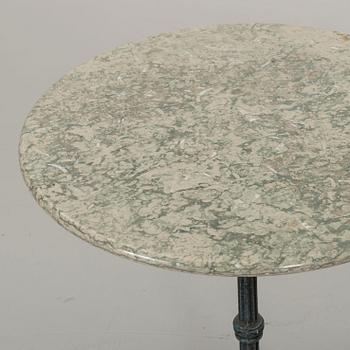 A IRON GARDEN TABLE.