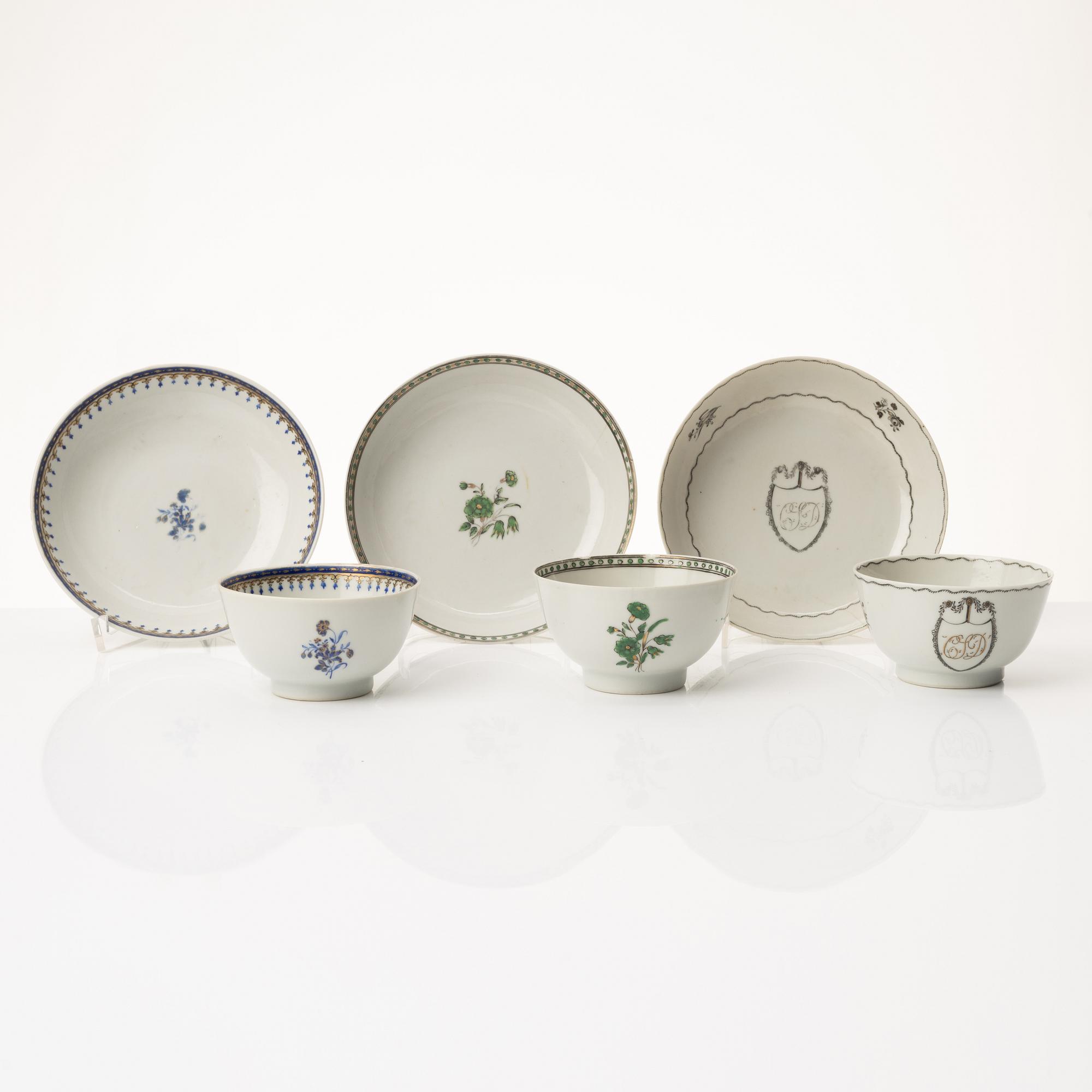 A group of nine Chinese export porcelain cups with stands, Qing dynasty, late 18th century.