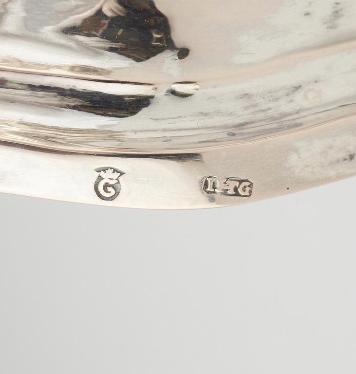 A pair of German mid 18th century silver candelsticks, marked IHG, probably Göttingen.