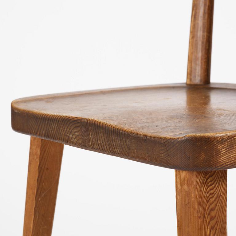 Axel Einar Hjorth, a set of six stained pine "Utö" chairs, Nordiska Kompaniet, Sweden, 1930s.