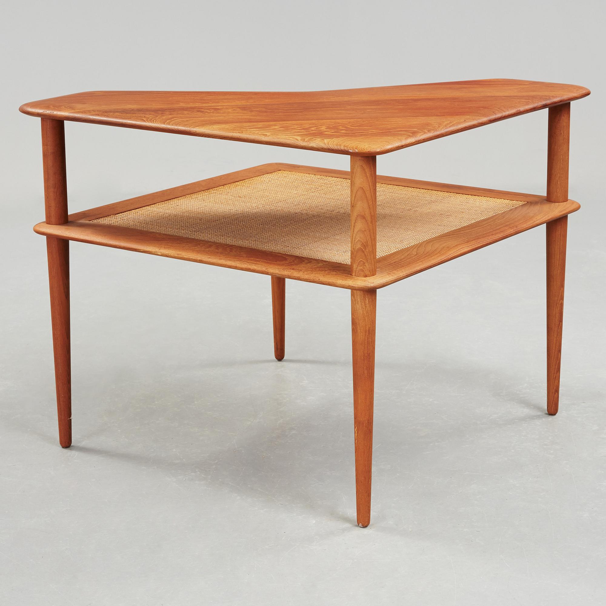 A set of two Danish 'Minerva' sofas with a table for France & Daverkosen.