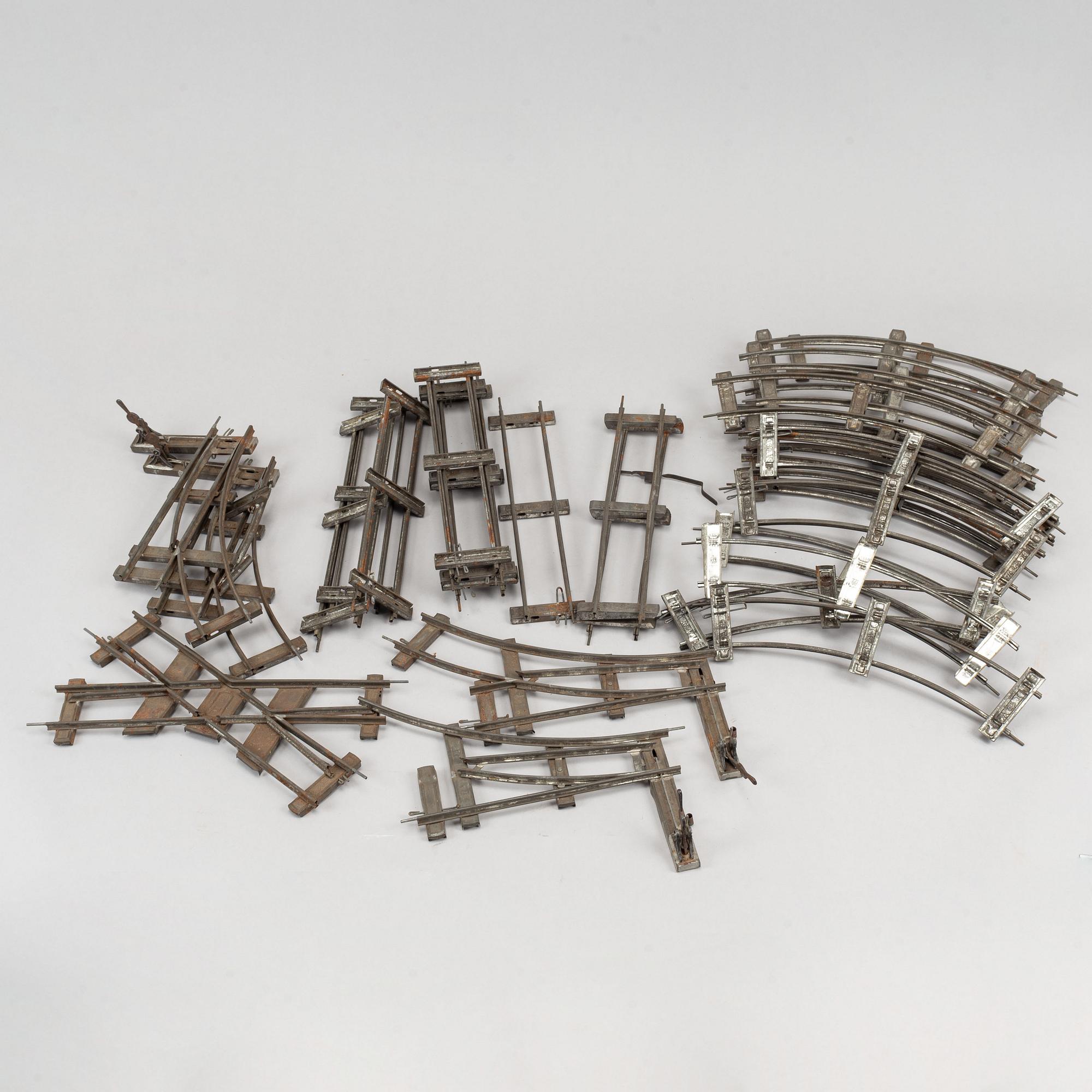 A steam engine wirt tender and wagons, early 20th century.