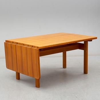 BØRGE MOGENSEN, a pine 'Asserbo' table and eight chairs from Karl Andersson & Söner.